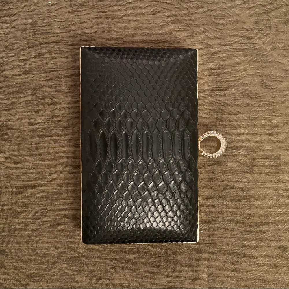Elegant Black Clutch with Ring Detail